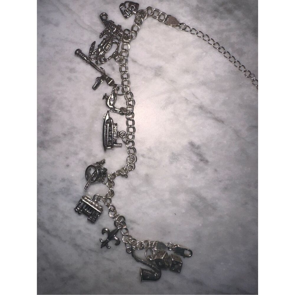 Sterling silver, New Orleans themed charm bracelet